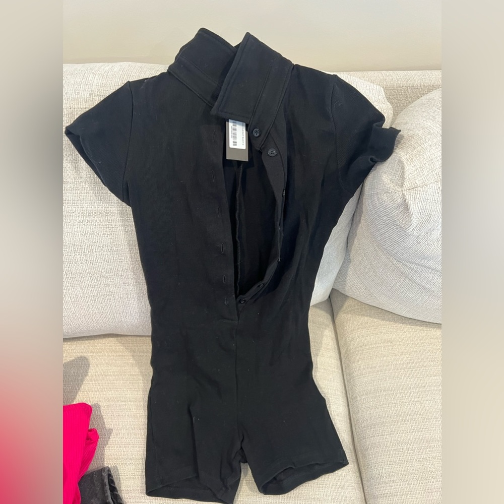 Black never worn body suit